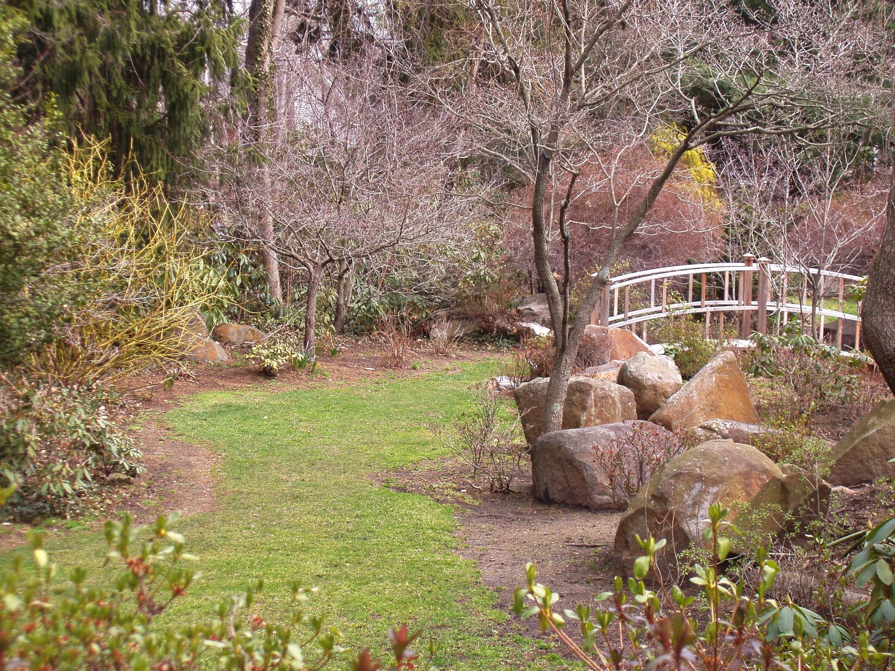 Sayen Park Botanical Garden - Japanese bridge - a white bridge over a green lawn