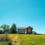 A picturesque landscape featuring a cozy tiny house nestled among trees