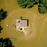 An aerial view of a picturesque tiny house set in a serene